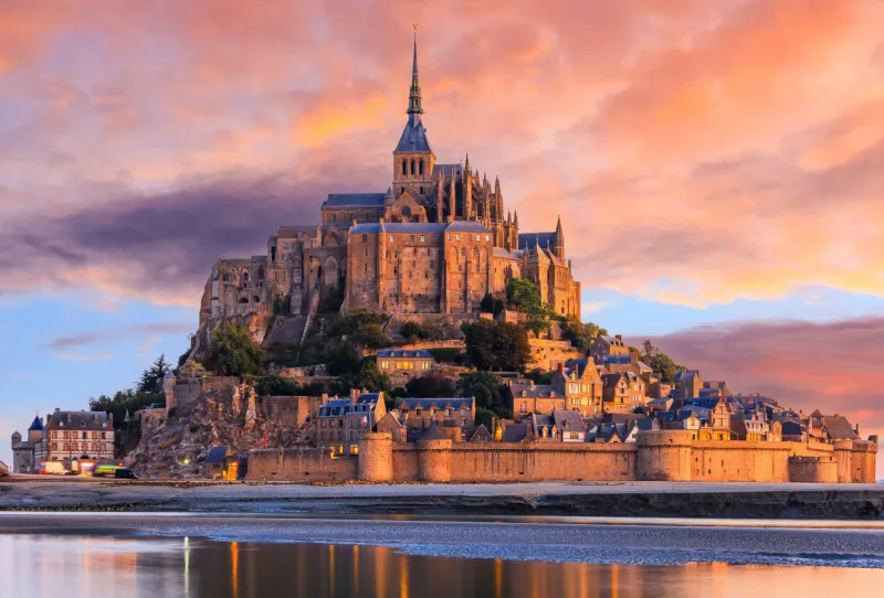 mont saint-michel view from the southeast during sunrise normandy, france
