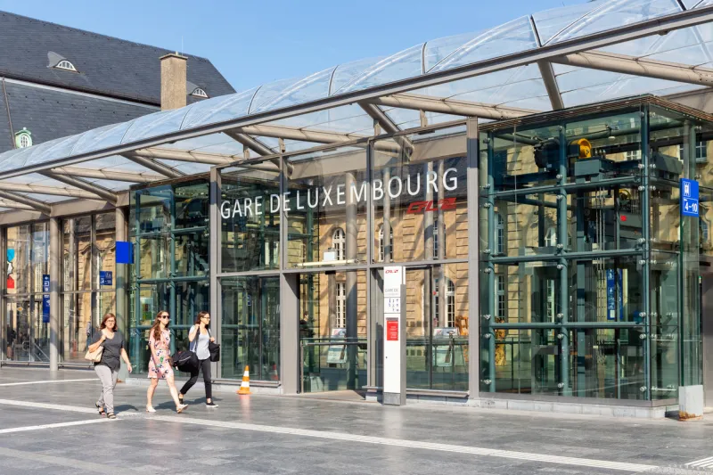 luxembourg city, luxembourg- august 19, 2018  railway station luxembourg city with three walking woman