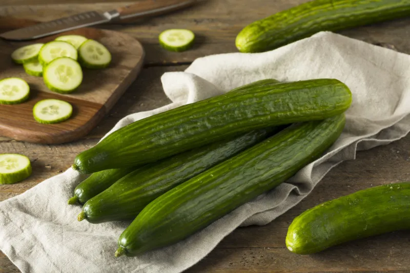 raw green organic european cucumbers ready to eat