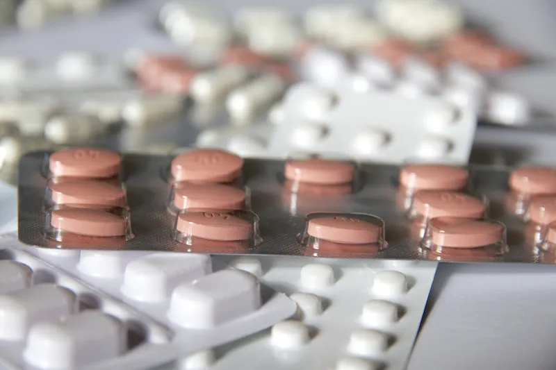 close up of various medicine pills in blister packaging