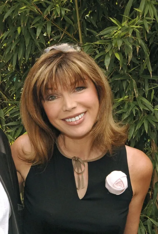 la chanteuse et actrice française isabelle morizet alias karen cheryl pose au village vip de roland garros pendant les internationaux de france de tennis 2005 à roland garros à paris, france, le 1er juin 2005 photo by gorassini-zabulon abaca
