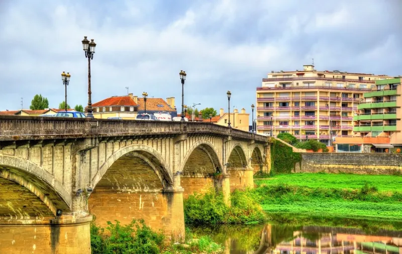 pont vieux, a bridge above the adour river in dax - france, landes