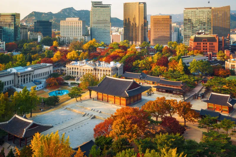autumn of deoksugung royal palace and seoul city hall from top view in seoul,south korea