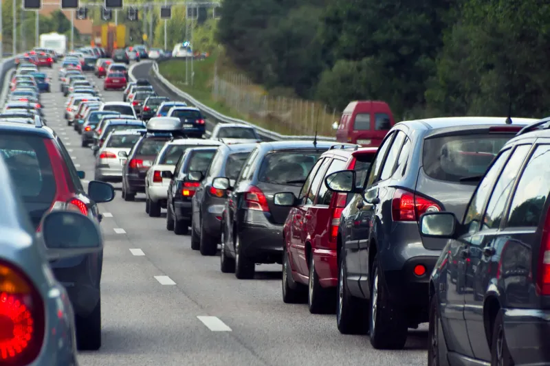 typical scene during rush hour a traffic jam with rows of cars shallow depth of field