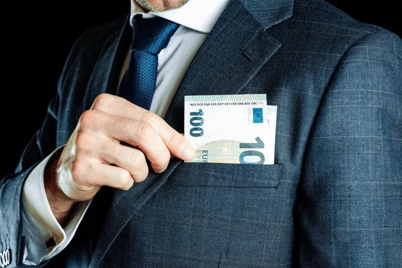 counting euro rich businessman holding hundred money of europe money euro bill background