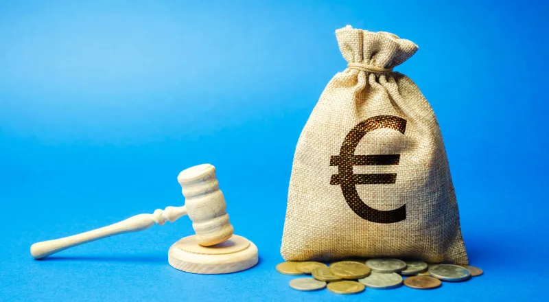 money bag and judge's hammer penalty for a crime and offense financial punishment violations of traffic laws fraud fine, penalization, mulct gavel euro