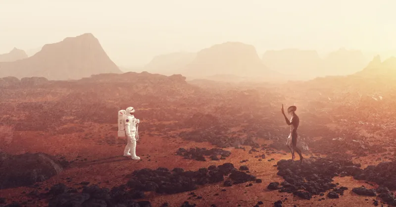 astronaut meeting an alien on planet such as mars 3d render