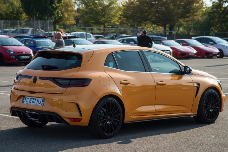 mulhouse - france - 13 september 2020 - rear view of orange renault megane rs at the showroom exhibition