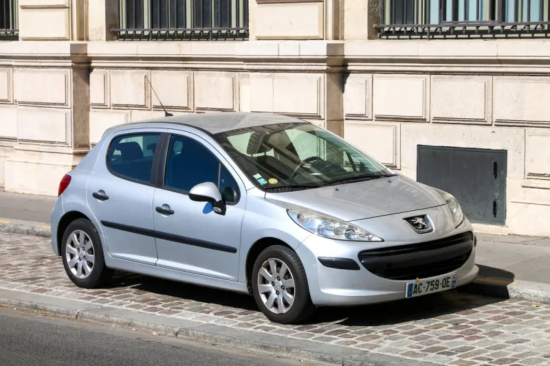 paris, france - september 15, 2019  motor car peugeot 207 in the city street