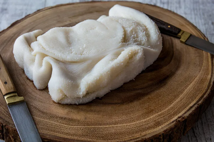 raw tripe   iskembe on a wooden surface