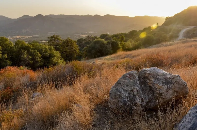 sunset in sierra nevada foothills king canyon road, dunlap, cali