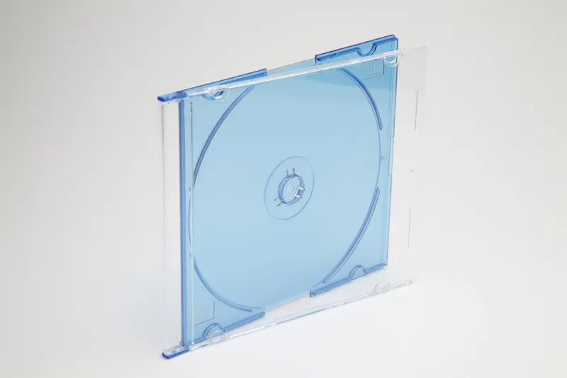 blue compact disc case against white background