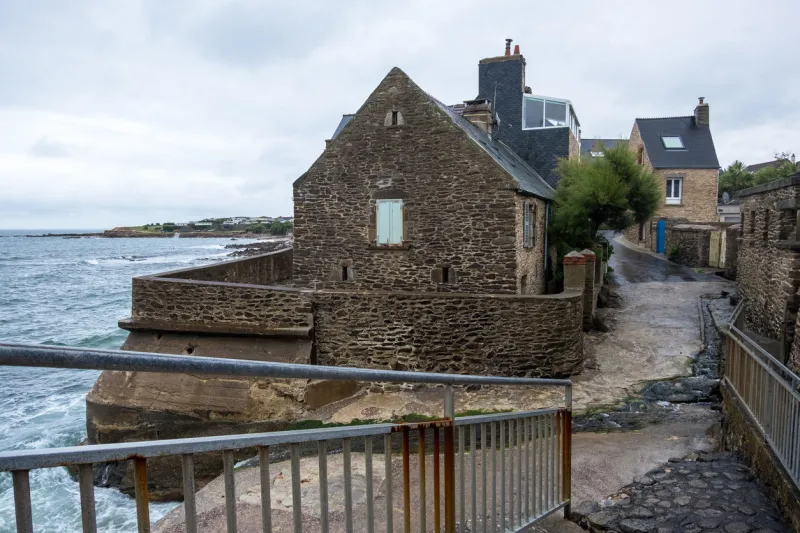 le becquet, france - august 16, 2018  traditional stone house on the shores of english channel in le becquet de tourlaville manche , normandy, france