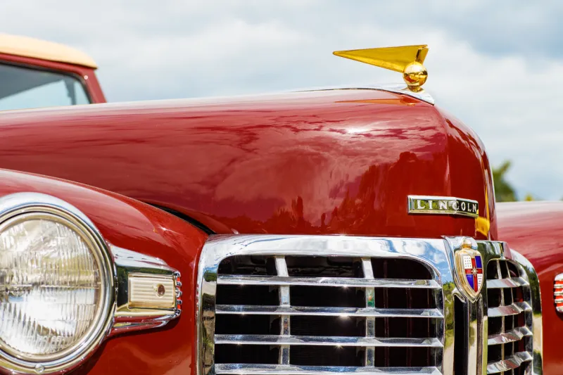 miami, florida usa - february 28, 2016  close up view of the front of a beautifully restored 1946 american lincoln continental automobile at a public car show along biscayne bay