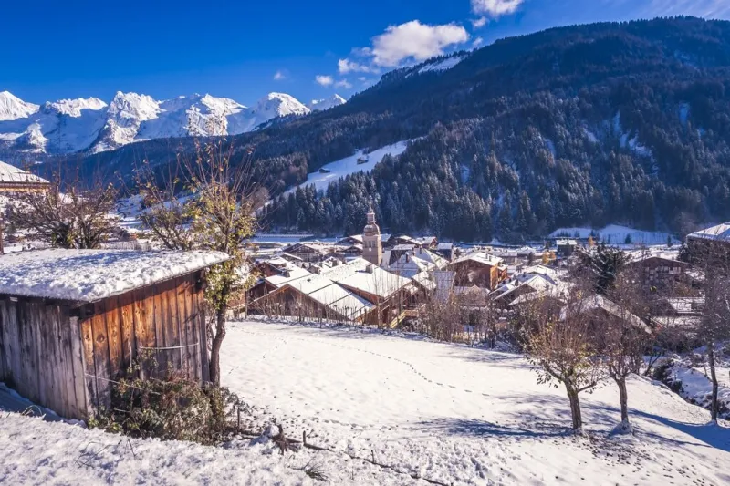 the early snow has already fallen on the mountains winter is coming and the winter sports season will begin soon in le grand-bornand french alps ski resort