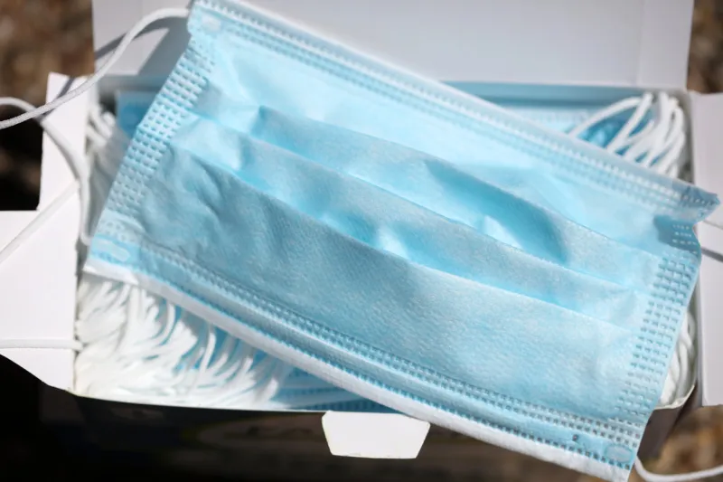 a lot of medical face masks in the box