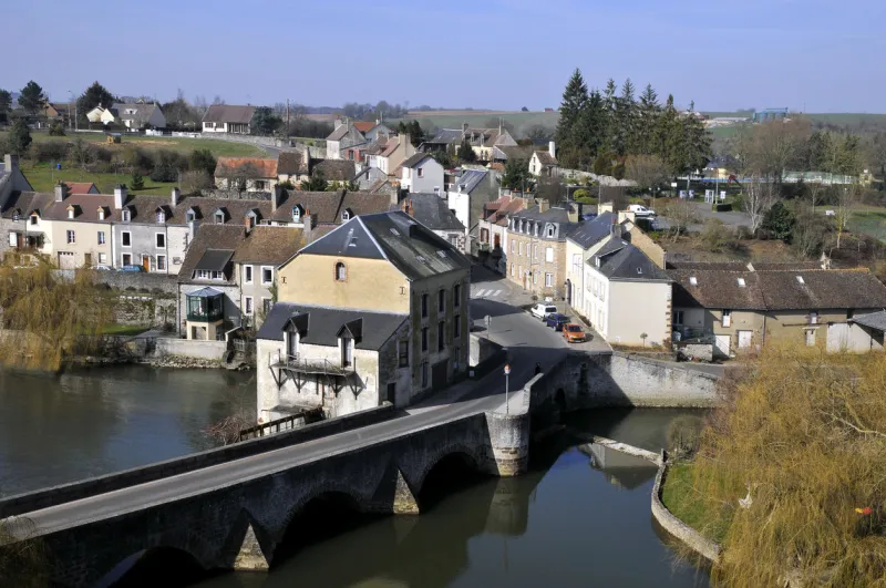 fresnay on sarthe in france with the old bridge and buildings