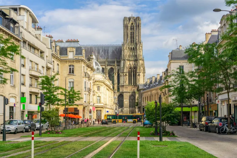 tram on the streets and architecture of reims a city in the champagne-ardenne region of france