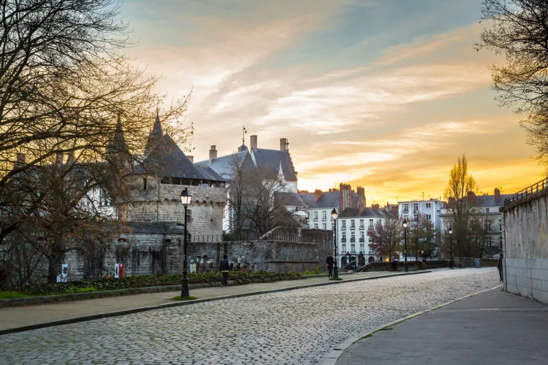 sunset over old town in nantes, france