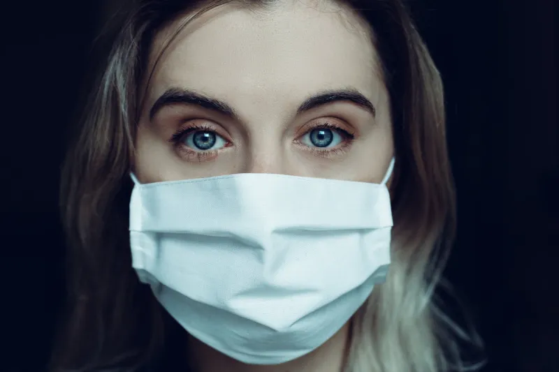 young woman wearing a medical mask