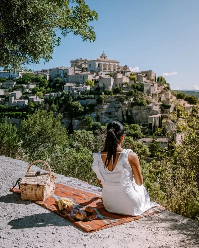 view of gordes, a small medieval town in provence, france a view of the ledges of the roof of this beautiful village and landscape europe