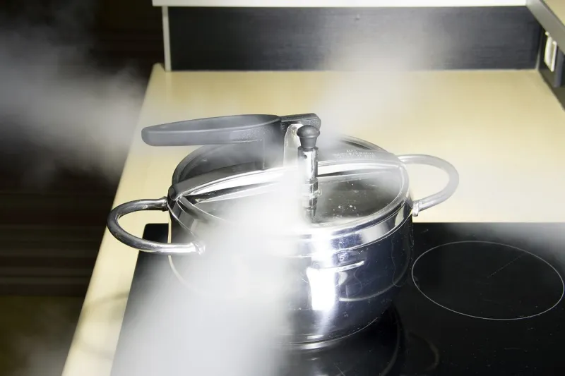 pressure cooker releasing hot steam