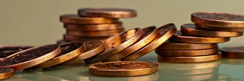 stacks of euro and euro cent coins the currency of the european union web banner