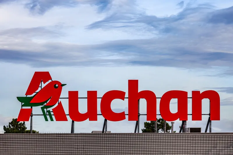 coina, portugal - october 23, 2019  auchan logo or symbol in the barreiro planet retail park auchan is a french hypermarket, supermarket or superstore chain