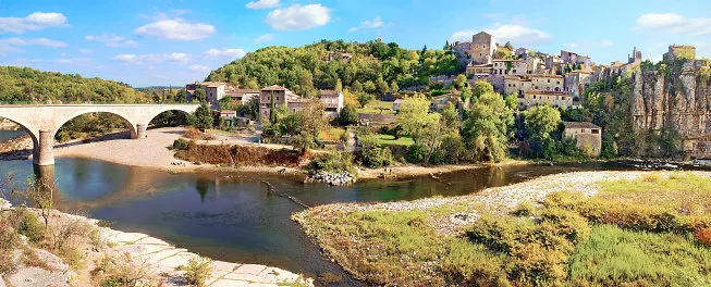 panoramic view of the picturesque village and the bridge that spans the river