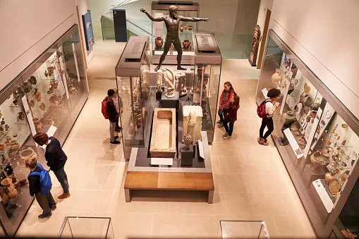 overhead view of busy museum interior with visitors