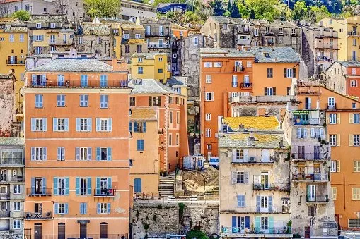 charming atmosphere of the oldest part of the city of bastia, with colored facades, stoned roofs, wooden shutters