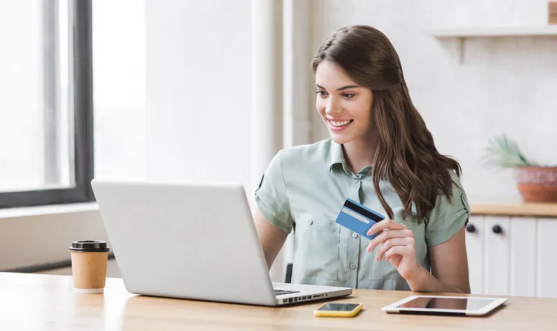 beautiful girl using laptop computer at work online shopping concept