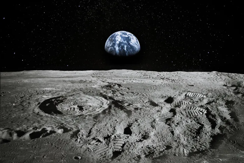view of moon limb with earth rising on the horizon footprints as an evidence of people being there or great forgery collage elements of this image furnished by nasa