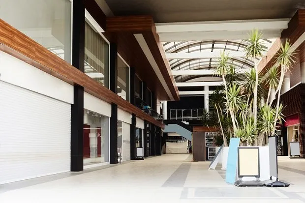 shopping centers empty because of covid-19, shutters closed