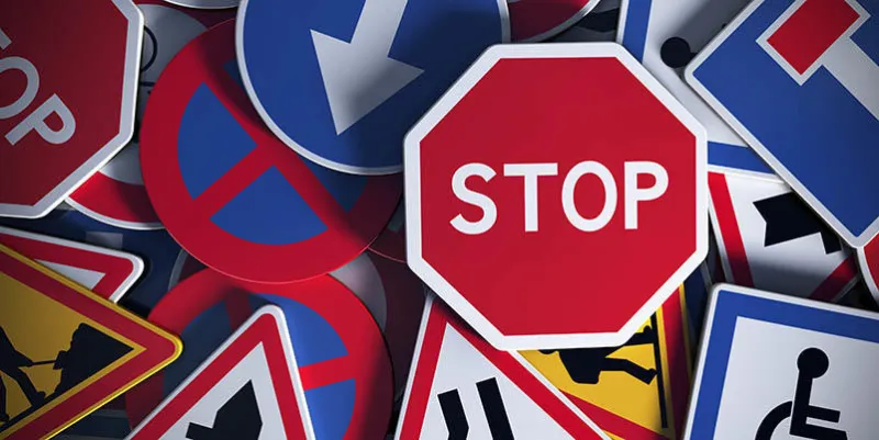 front view of numerous french traffic road signs concept image for background