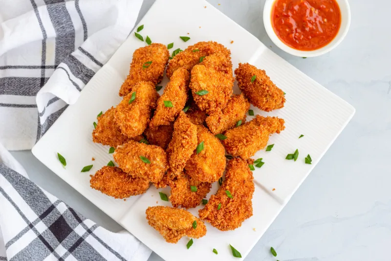 chicken nuggets with ketchup, popular american fast food, snack, quick bites, appetizer, directly above photo