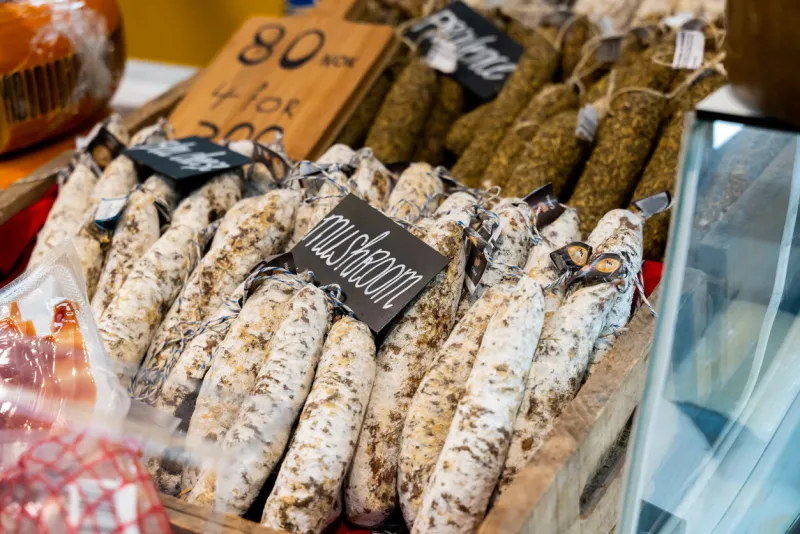 oslo, norway - apr 20th 2022  delicious sausages on display in a butcher shop