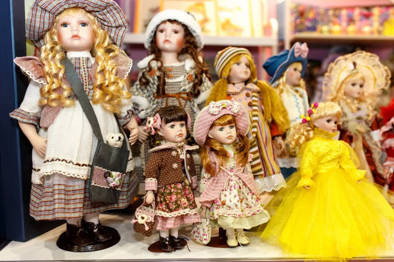 vintage porcelain dolls found on the flea market, isolated