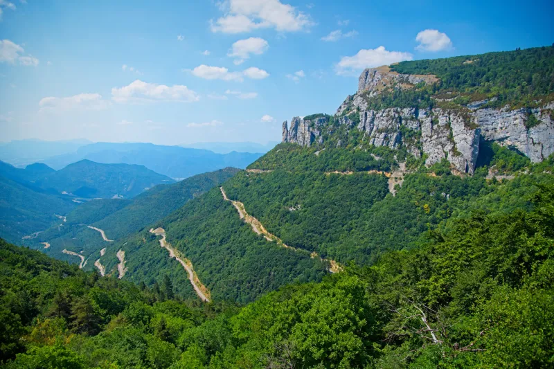 curvy road in mountain pass col de rousset in vercors massif, france