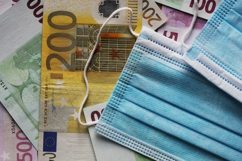 medical face masks and money surgical face mask covid-19 has caused a shortage of face masks euro banknotes and medical face masks