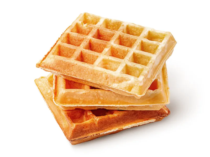 three crispy fried french waffles isolated on white background