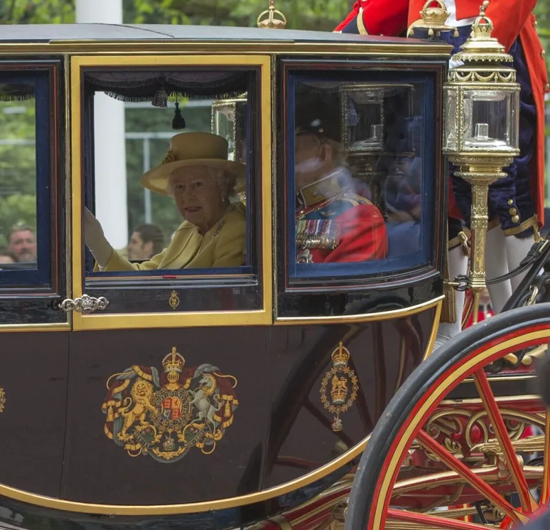 london, england - june 16, 2012  queen elizabeth ii and the duke of edinburgh in a carriage on the mall en route from buckingham palace for the trooping of the colours at the horseguards parade