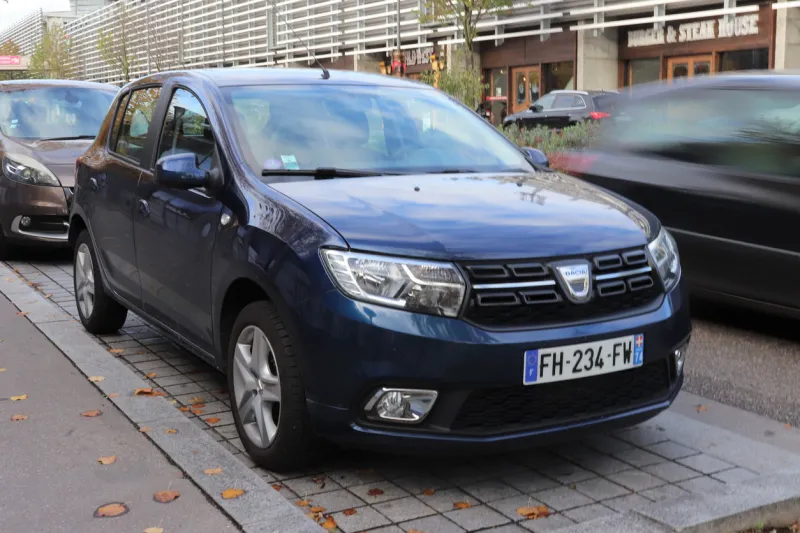 dacia sandero, blue 4-door sedan car, town of vaulx en velin, department of rôône, france