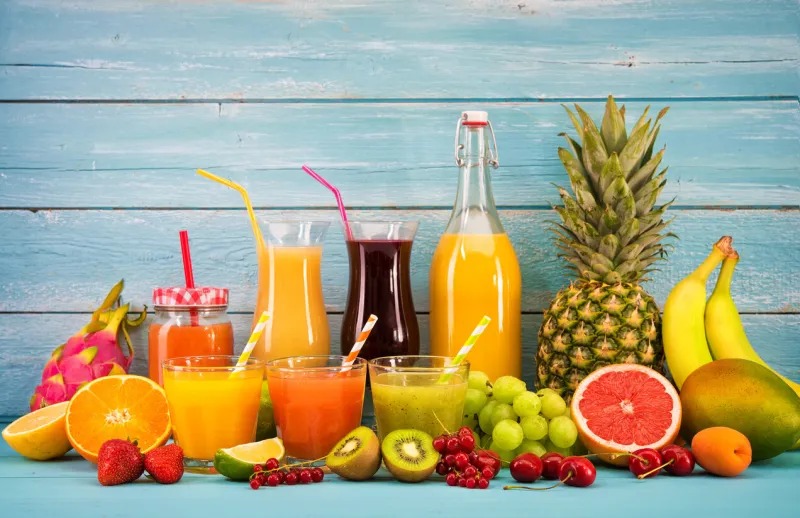 various freshly squeezed fruits juices