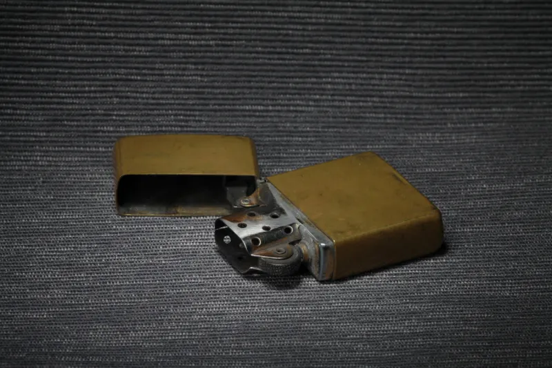 vintage lighter close-up, still life black and white