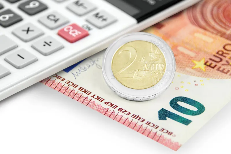12,00 euro and calculator closeup