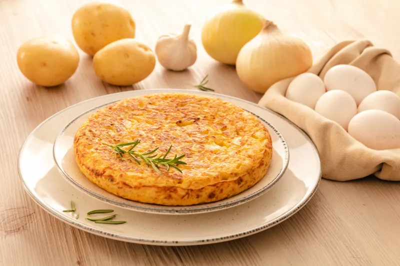 spanish omelette with potatoes and onion, typical spanish cuisine tortilla espanola