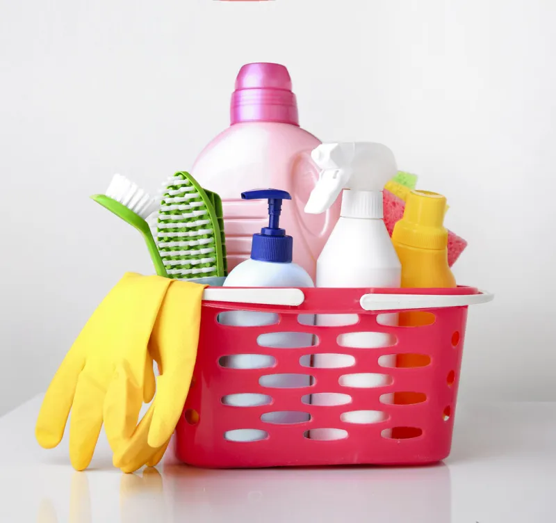sanitary,detergent bottles and sponges closeupgroup of household productsdomestic disinfectant housekeeping items in basket