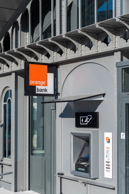 issy-les-moulineaux, france - june 6, 2021  atm machine of the french online bank orange bank