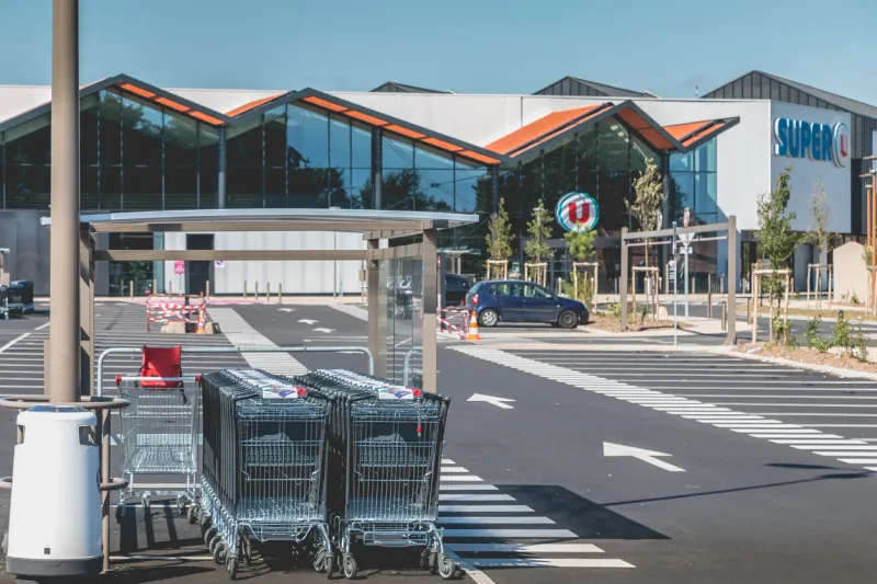 bretignolles sur mer, france - july 31, 2016  view of the entrance of a super u store, a supermarket dependent on a cooperative of french retailers